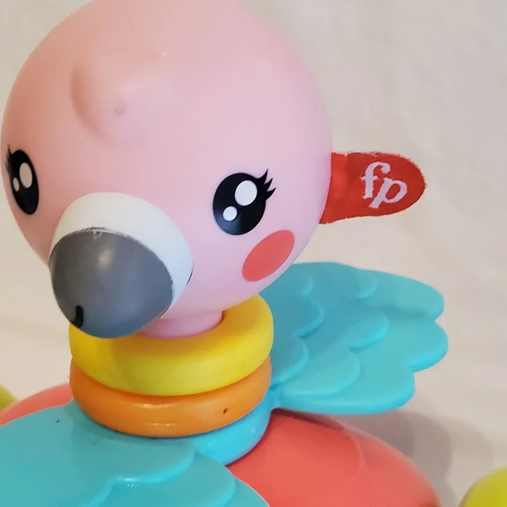 Fisher Price Paradise Pals Flamingo Roll A Round Rainbow Smile Face Pull Toys